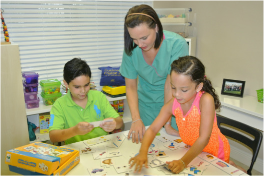 Linette Garcia Helping Two Children At Talk To Me Therapy LLC